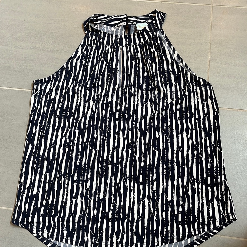 NEVER WORN. Medium going out halter top.